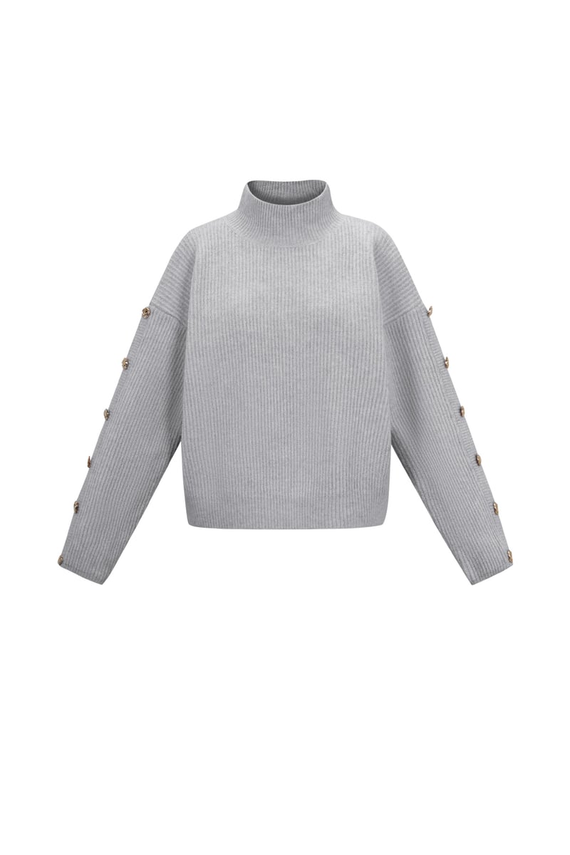 Sweater with buttons on the sleeves