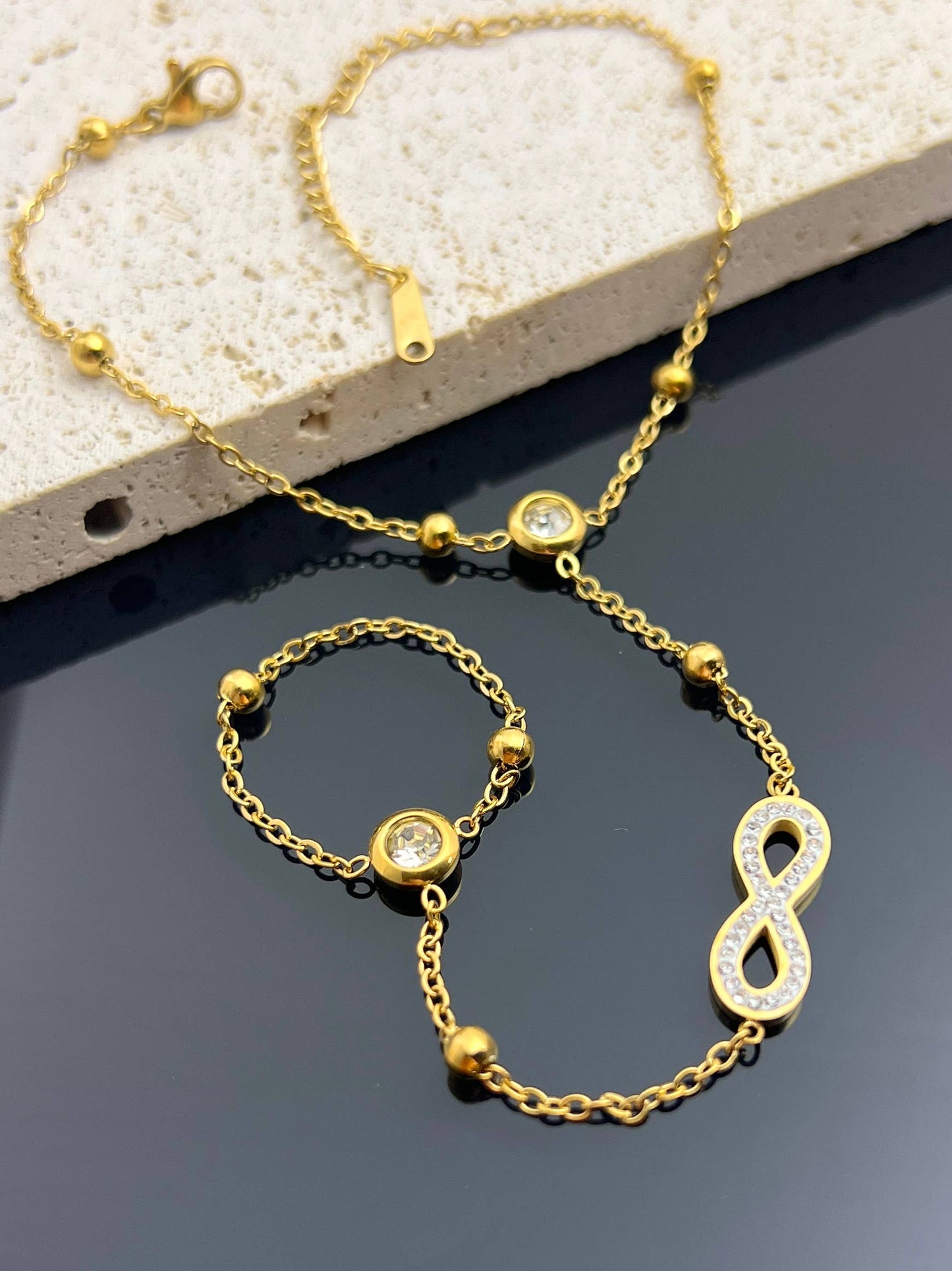 Pulseira de mão infinita em aço inoxidável